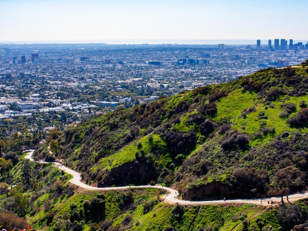 Hiking trail in Griffith Park with LA in the background on a clear day