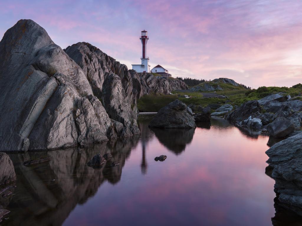 Cape Forchu Lighthouse at sunrise. Nova Scotia, Canada.