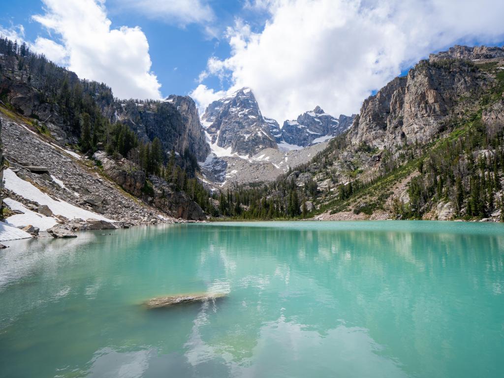 Grand Teton National Park, USA with the Delta Lake in the foreground and mountains in the background. 