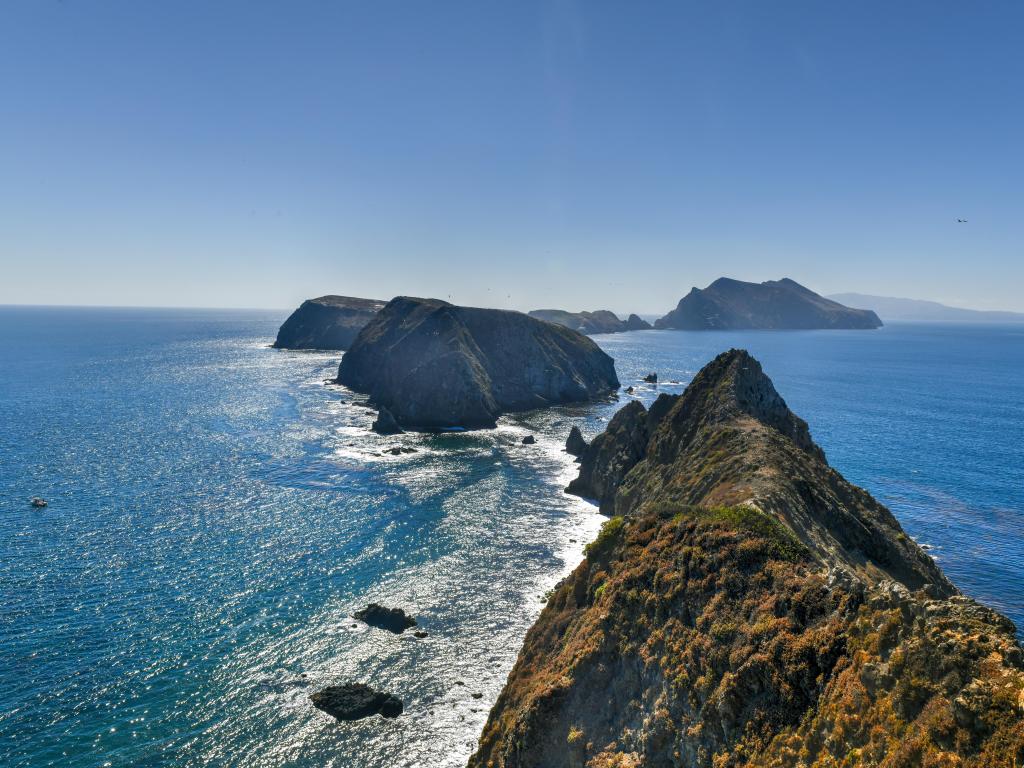 Channel Islands National Park, California with a view from Inspiration Point, Anacapa island overlooking the sea and other islands in the distance on a clear sunny day.