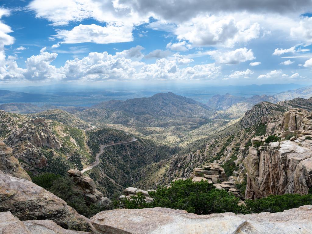 A panoramic view from the drive up to the top of Mount Lemmon, USA against a blue sky.