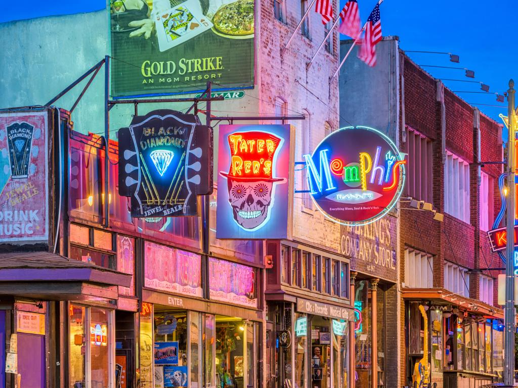 Memphis, Tennessee, USA with a view of the blues clubs on historic Beale Street at twilight.