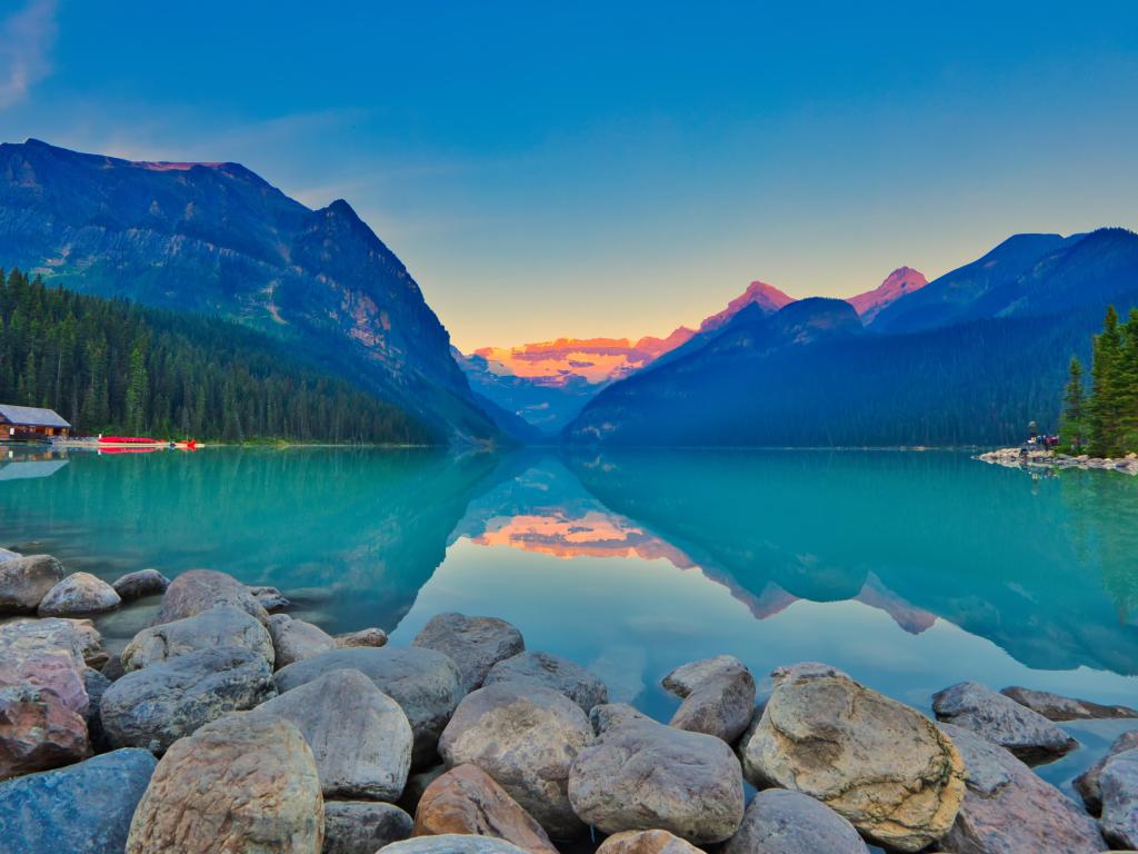 Panoramic view of the world famous Lake Louise from shore line to Victoria Glacier. From the boat rental house to the shore the Chateau Lake Louise.