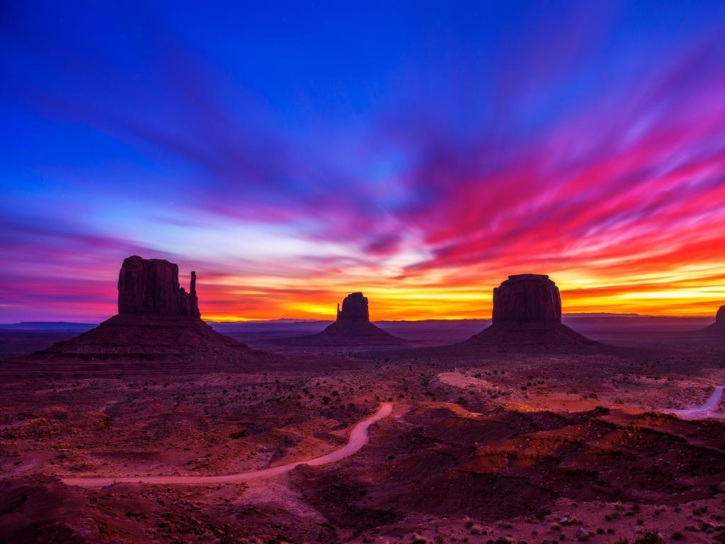 Dramatic and very colorful sunrise over Monument Valley in Arizona, USA