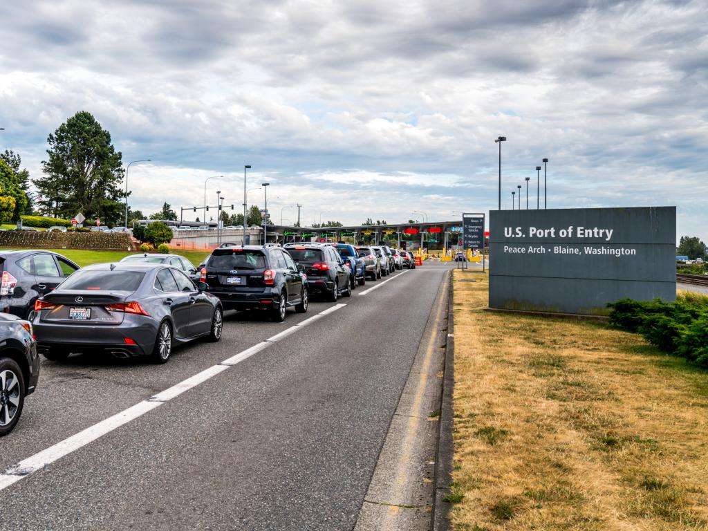 Queue of cars at the Canada - US Peace Arch border crossing