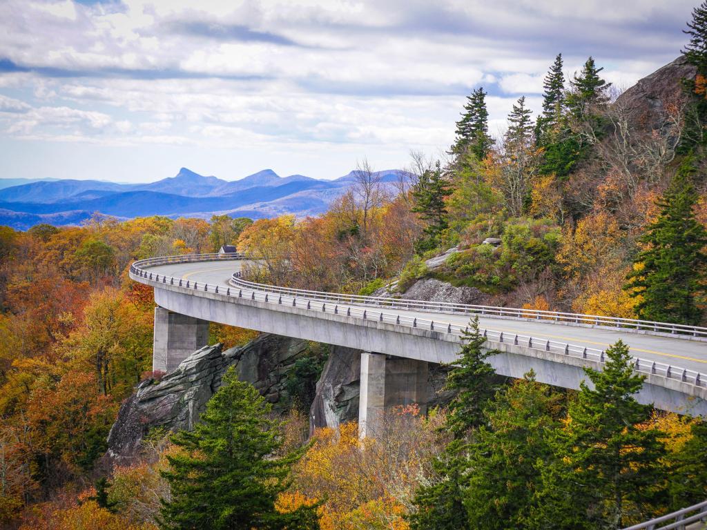 Blue Ridge Parkway, North Carolina, USA taken at Autumn Linn Cove Viaduct with Fall foliage, mountains in the distance at the bridge at Grandfather Mountain.