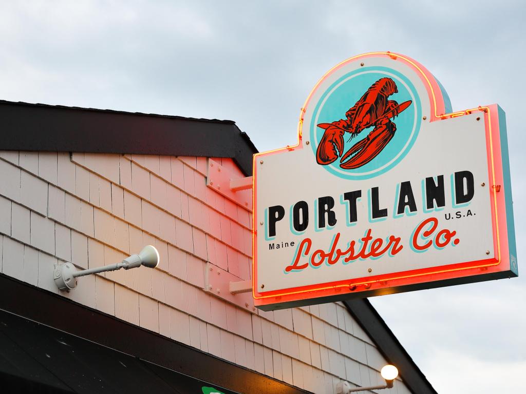 The Sign of Portland Lobster Company after sunset. Portland Lobster Company is a historical seasonal waterside lobster shack at Portland, ME.