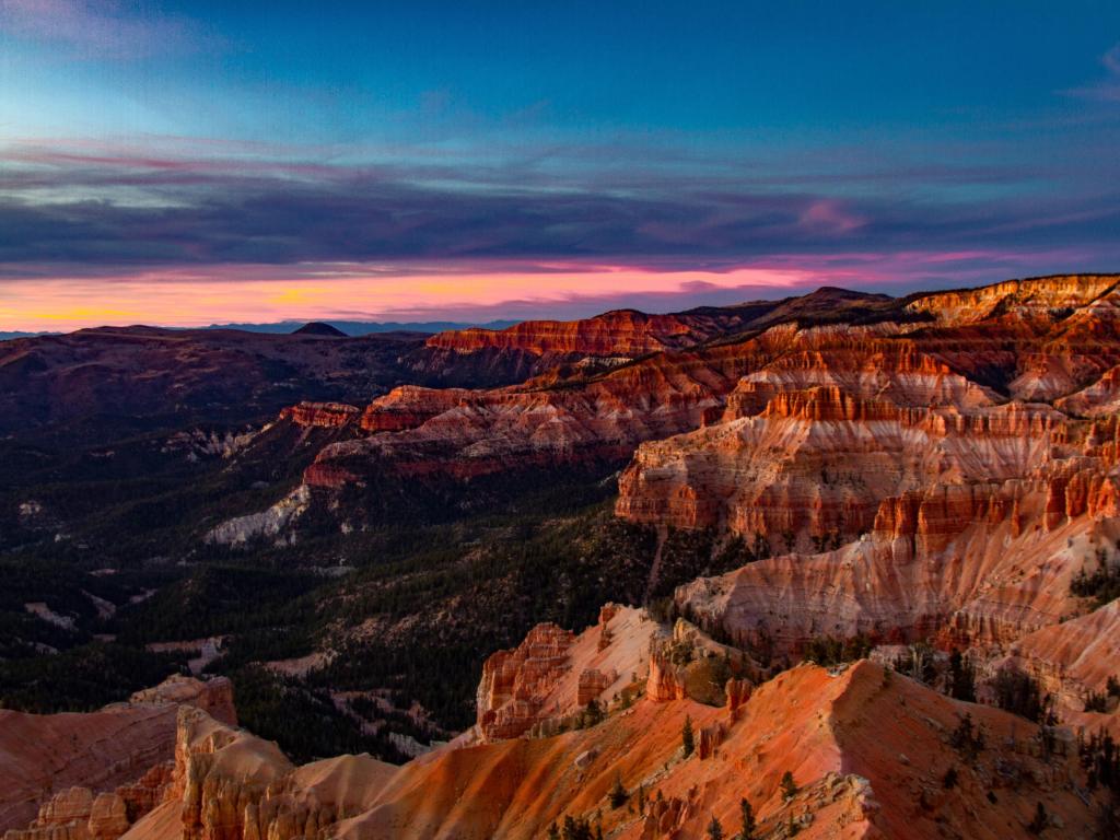 Cedar Breaks National Monument, Utah, USA with an incredible dramatic sunset over the stunning red rocks. 