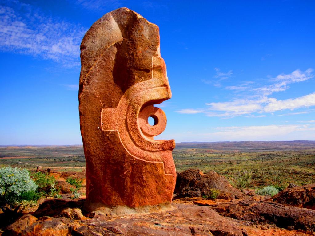 Broken Hill, Australia with a large sculpture overlooking the flat plains below on a clear day. 