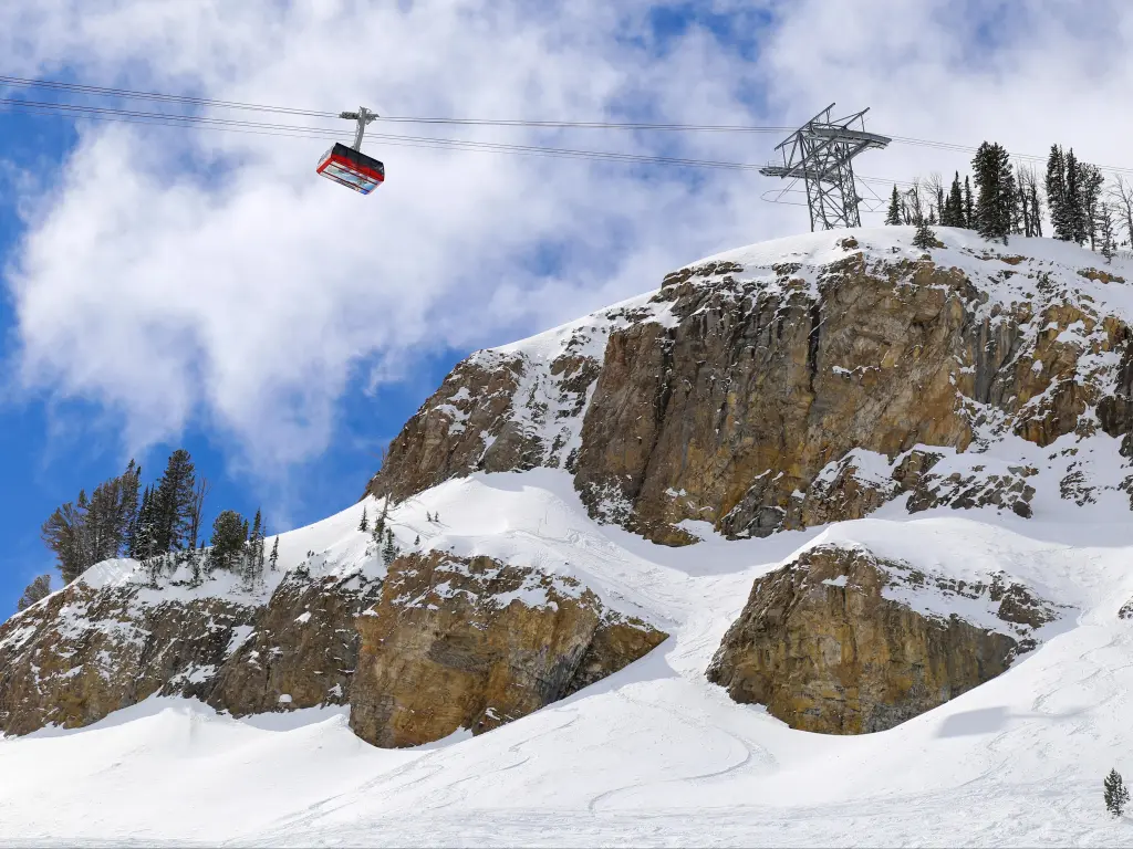 Snowy mountain side and soaring ski tram in Jackson Hole, Wyoming