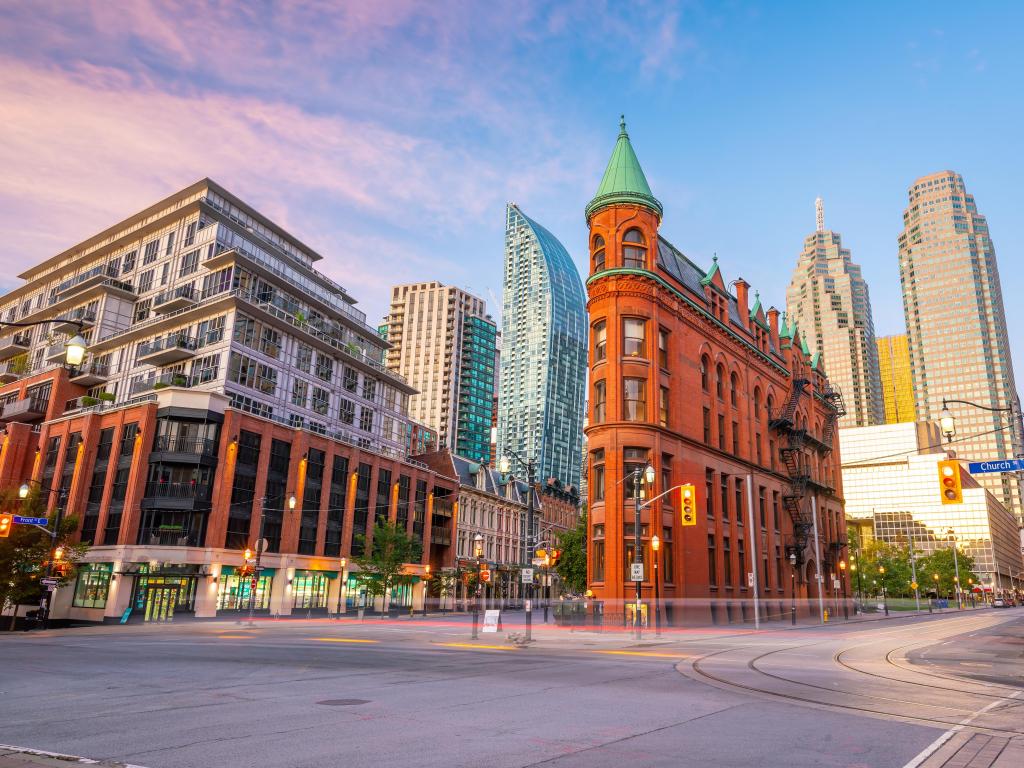 Toronto, Ontario, Canada taken at downtown Toronto at twilight with a mix of fantastic buildings against a blue sky. 