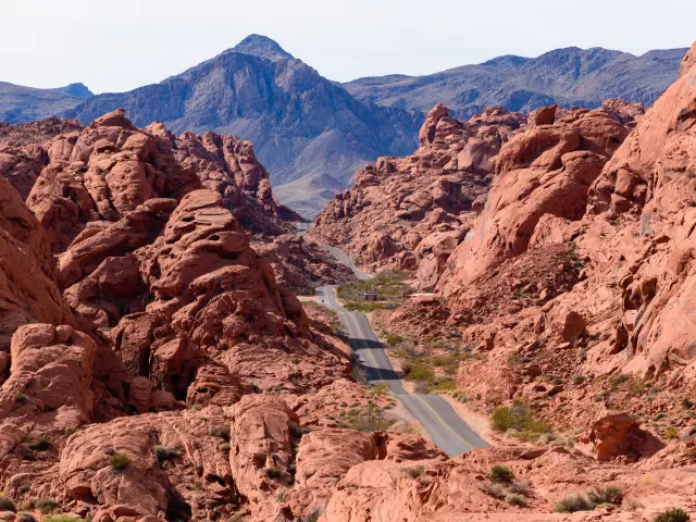 Famous Mouse's Tank Road winds through the tall and jagged rocks either side, through the Valley of Fire, Nevada