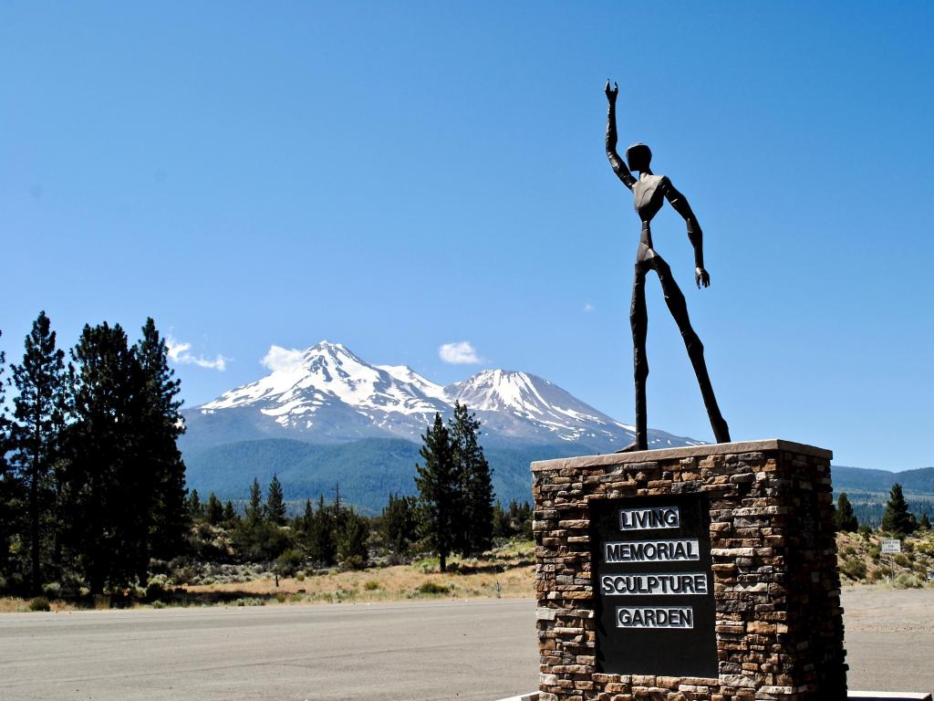 Art installation and war memorial in Klamath National Forest with Mount Shasta in the background