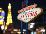 Welcome to Fabulous Las Vegas Neon Sign. Intentional Blurred Las Vegas Strip In Background