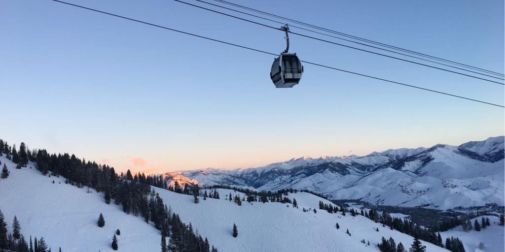 Cable car ascends a snow-covered mountain in Sun Valley, Idaho