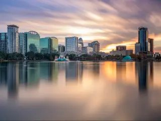 Orlando, Florida, USA skyline at Eola Lake.