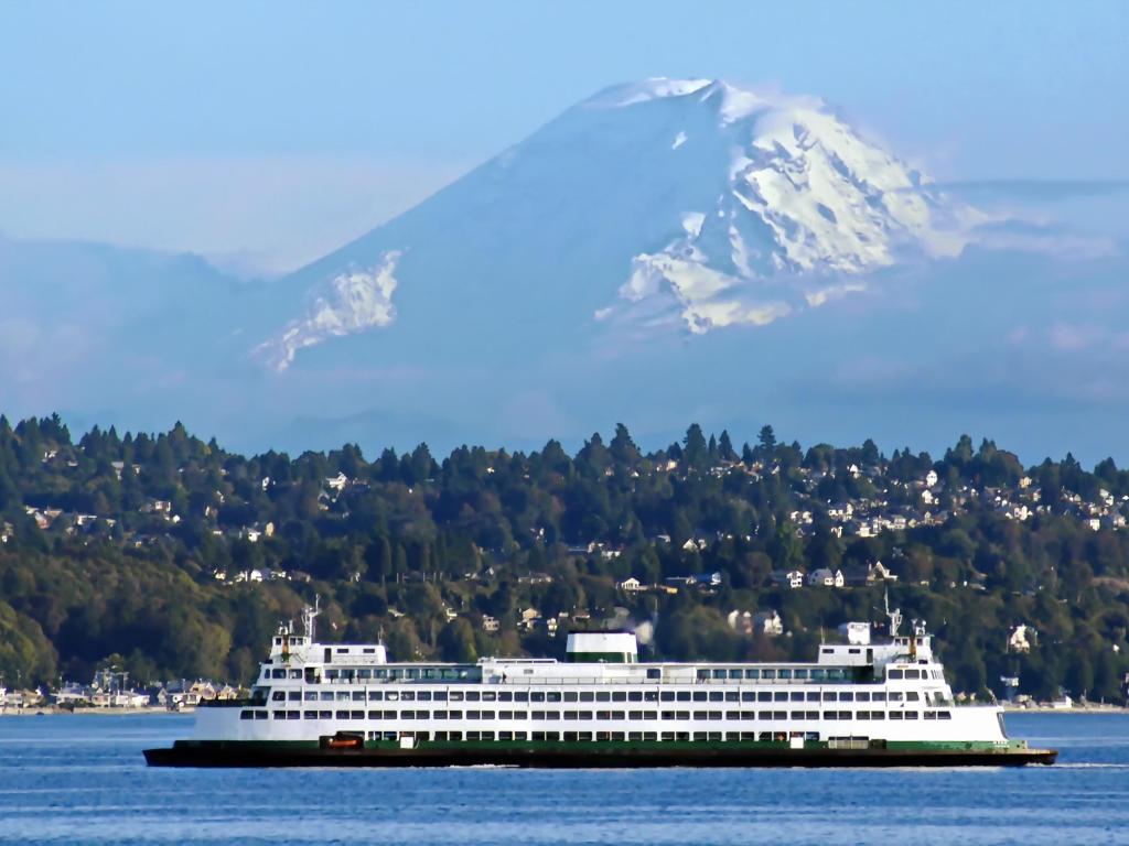 The Bainbridge - Seattle Ferry approaching Seattle on a misty day. Mt. Rainier in the background 