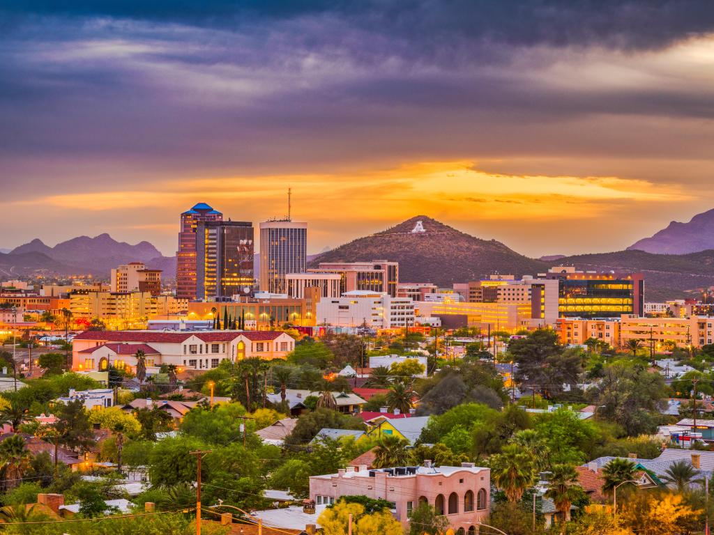 Tucson, Arizona, USA downtown skyline with Sentinel Peak at dusk with a view of the Mountaintop "A" for "Arizona" in the distance.