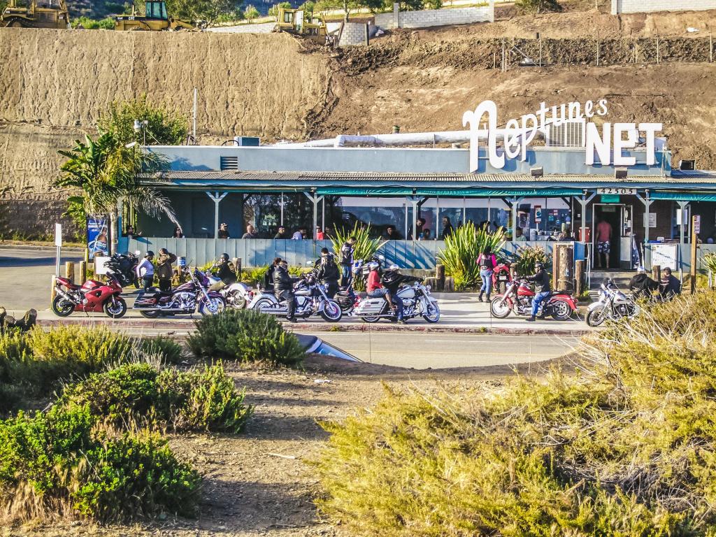 Famous eatery Neptune's Net with bikers on Pacific Coast Highway, California on a sunny day