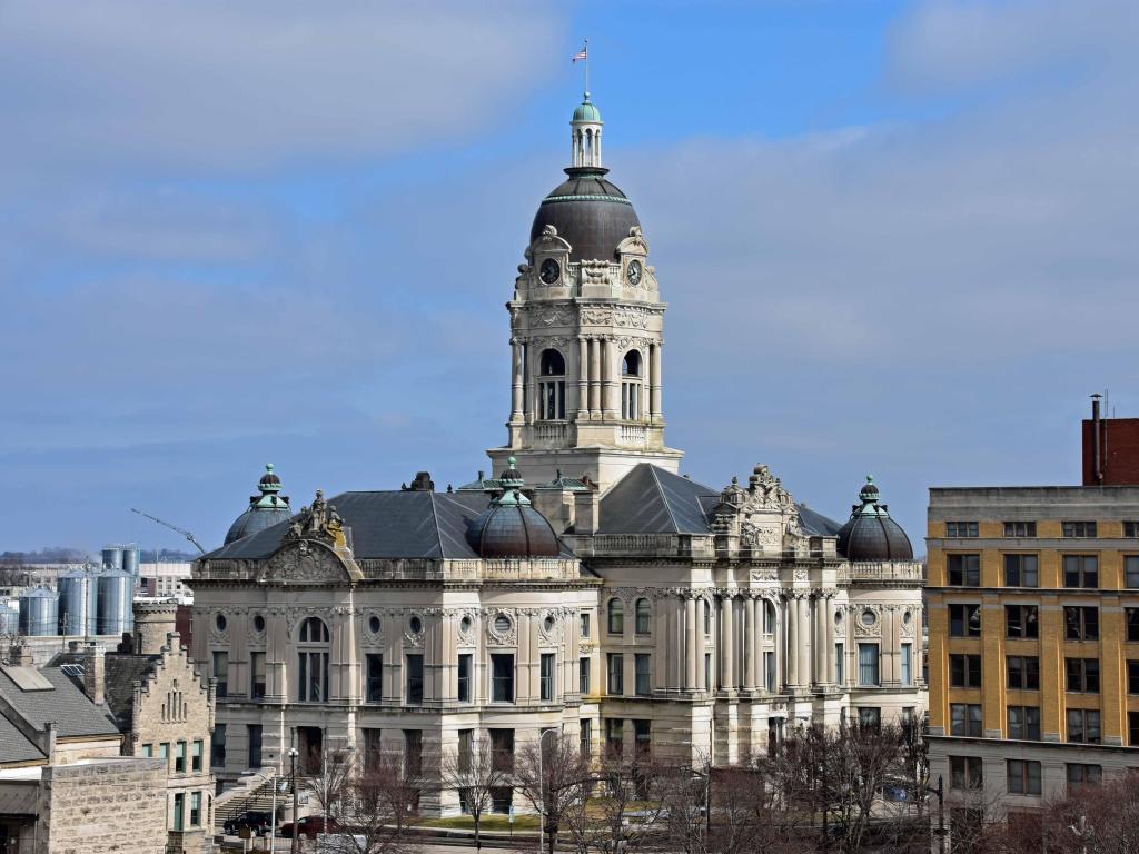 Cityscape photo of the Evansville, Indiana on a cloudy day with the Old Courthouse in focus