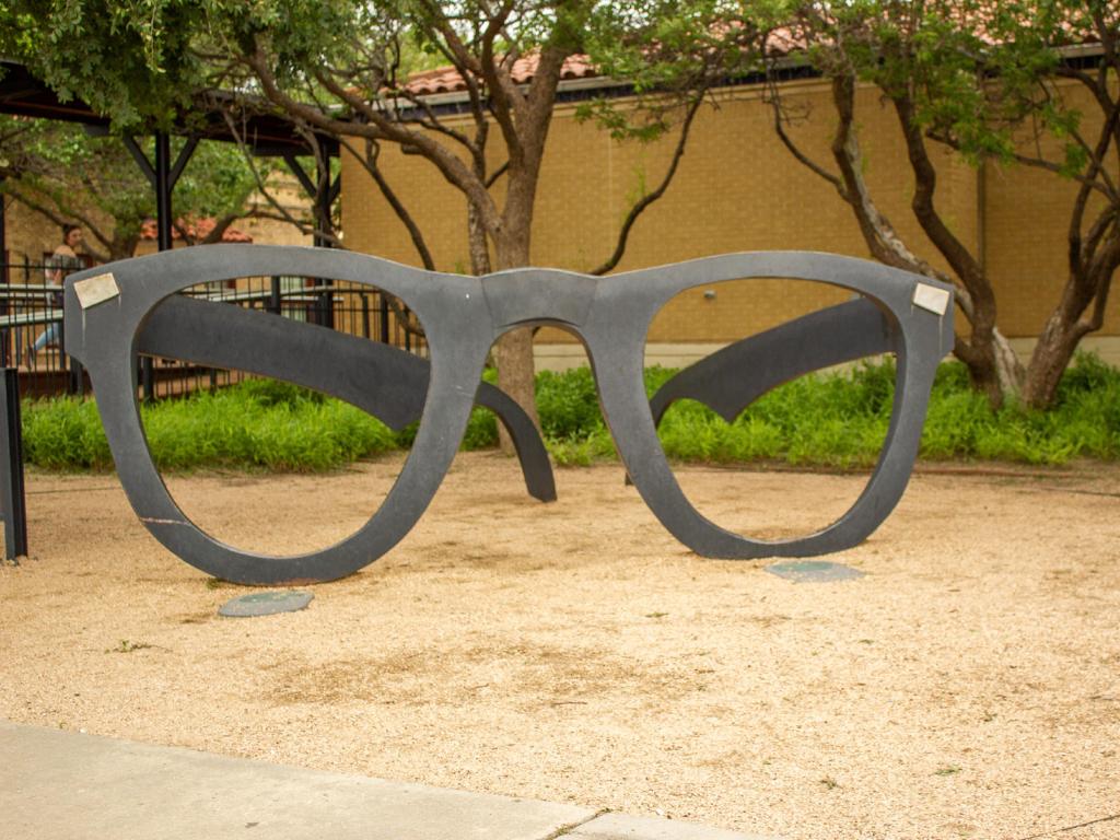 Lubbock, Texas, USA with a view of the art piece of metal glasses at the Buddy Holly museum.