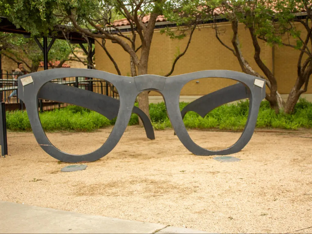 Lubbock, Texas, USA with a view of the art piece of metal glasses at the Buddy Holly museum.
