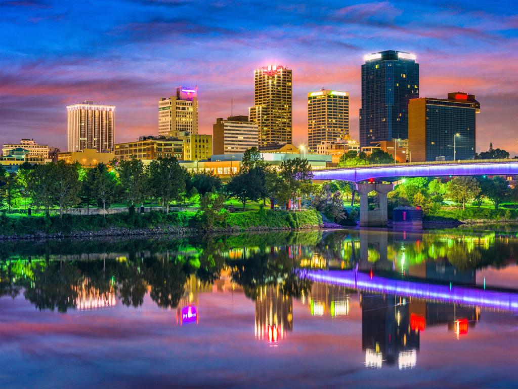 Little Rock, Arkansas, USA taken at the downtown skyline on the Arkansas River at night.