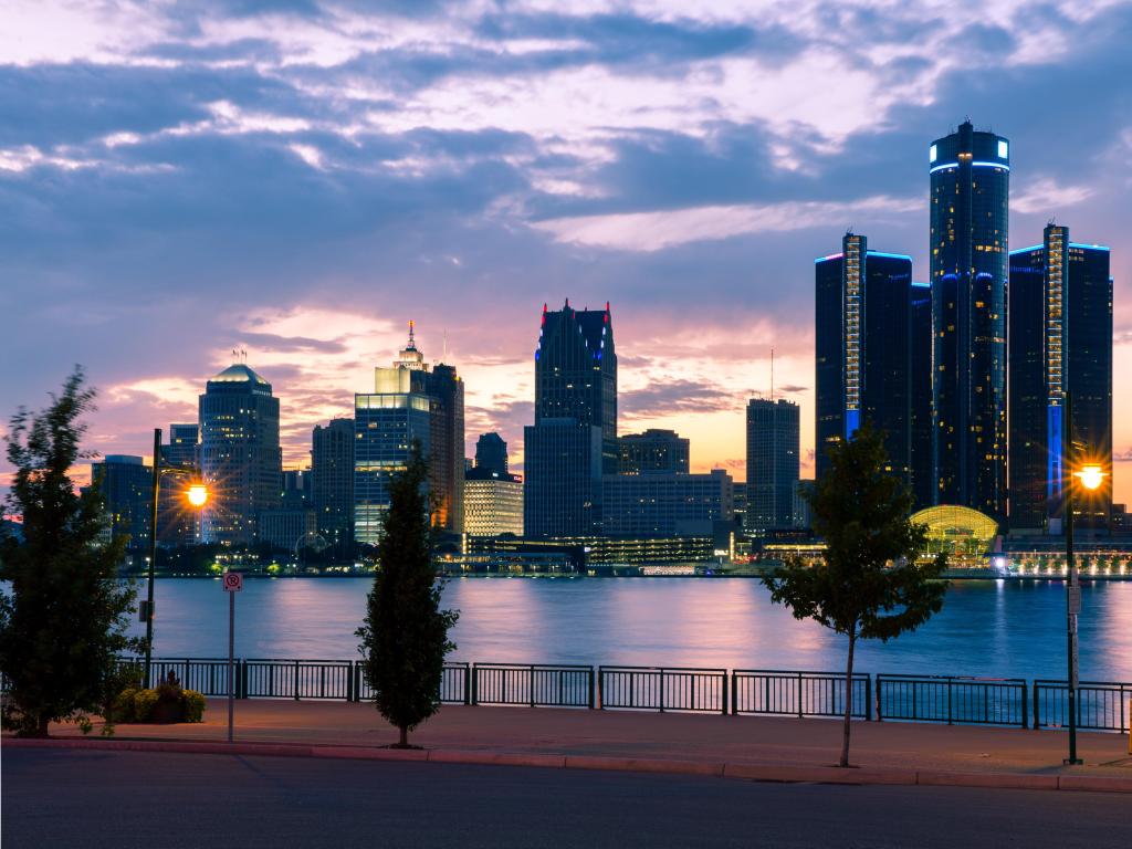 Detroit, USA taken with the river and pavement in the foreground and the city skyline in the background, taken just after sunset.