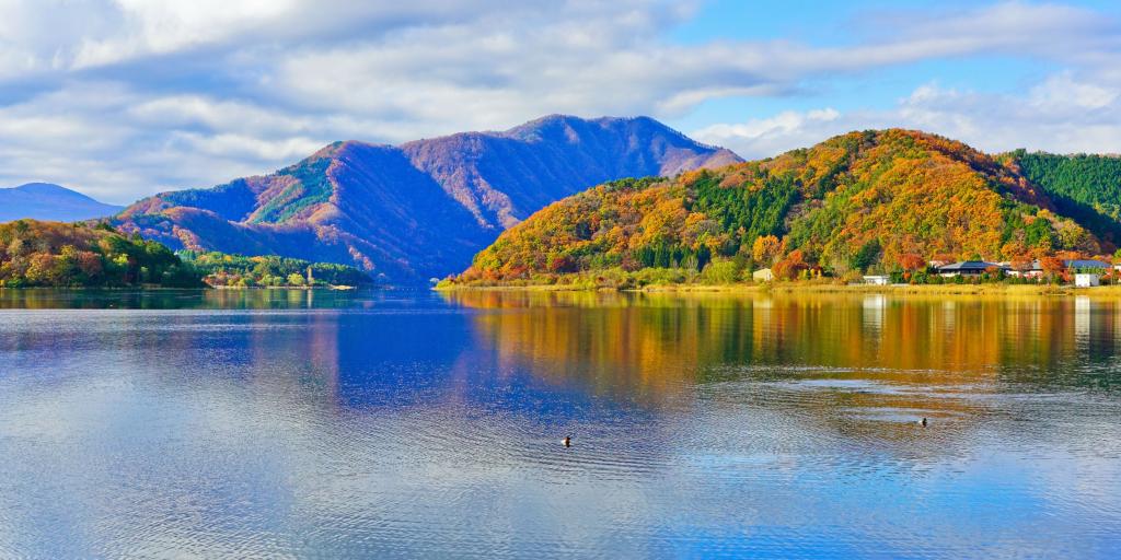 View across Lake Kawaguchi, Japan with mountains in the background 