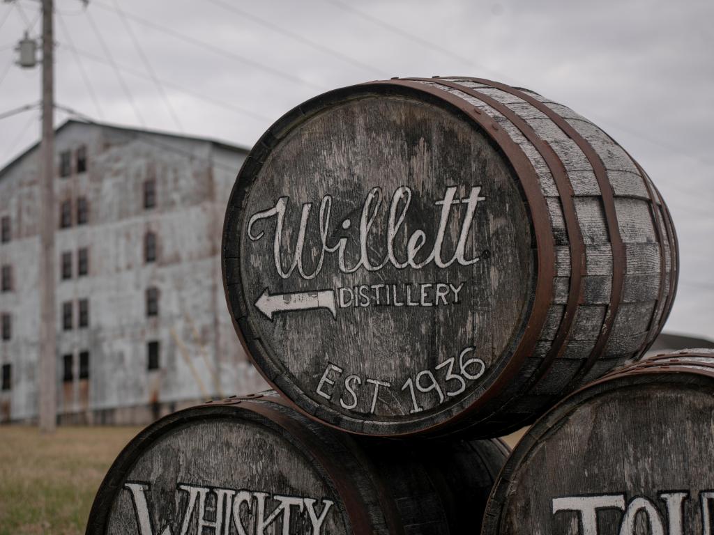 Willett Bourbon Whiskey Distillery barrel sign on an overcast day