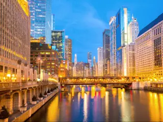 City of Chicago downtown and River with bridges at dusk.