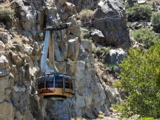 View of Palm Springs Aerial Tramway Cabin in front of  mountains