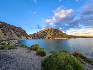 View of a lake and mountain on the approach to the East Entrance to Yellowstone National Park, Wyoming.