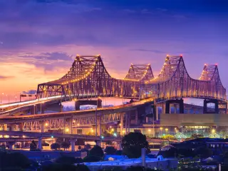 New Orleans, Louisiana, USA at Crescent City Connection Bridge at night.