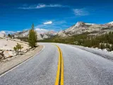 Driving through Tioga Pass in the national park on a sunny day