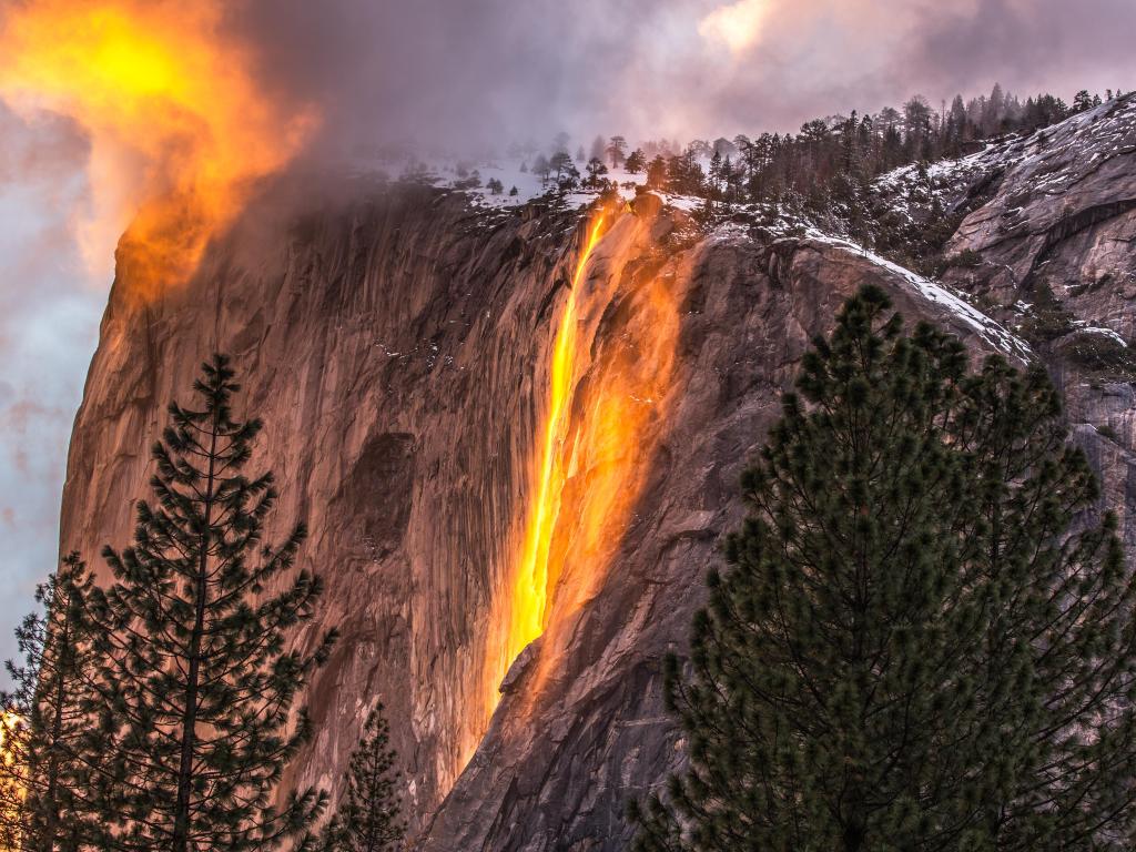 Horsetail Falls in February as the sun sets and makes it look like the waterfalls are made of fire