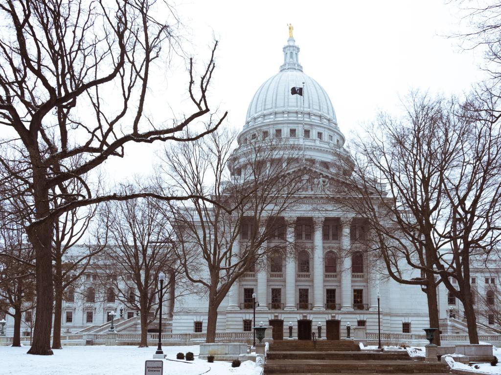 Capitol building on a snowy winter day in downtown of Madison, Wisconsin, USA