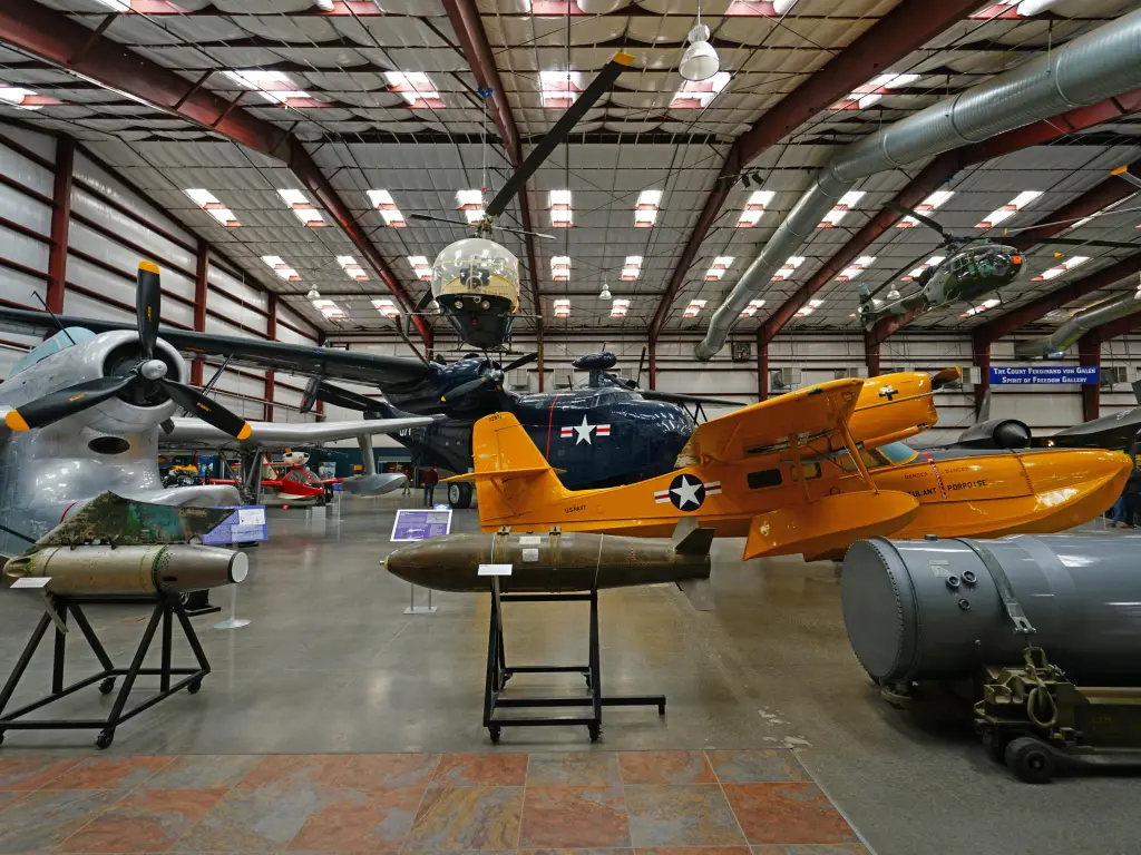 Retired vintage aircrafts inside a hangar on display
