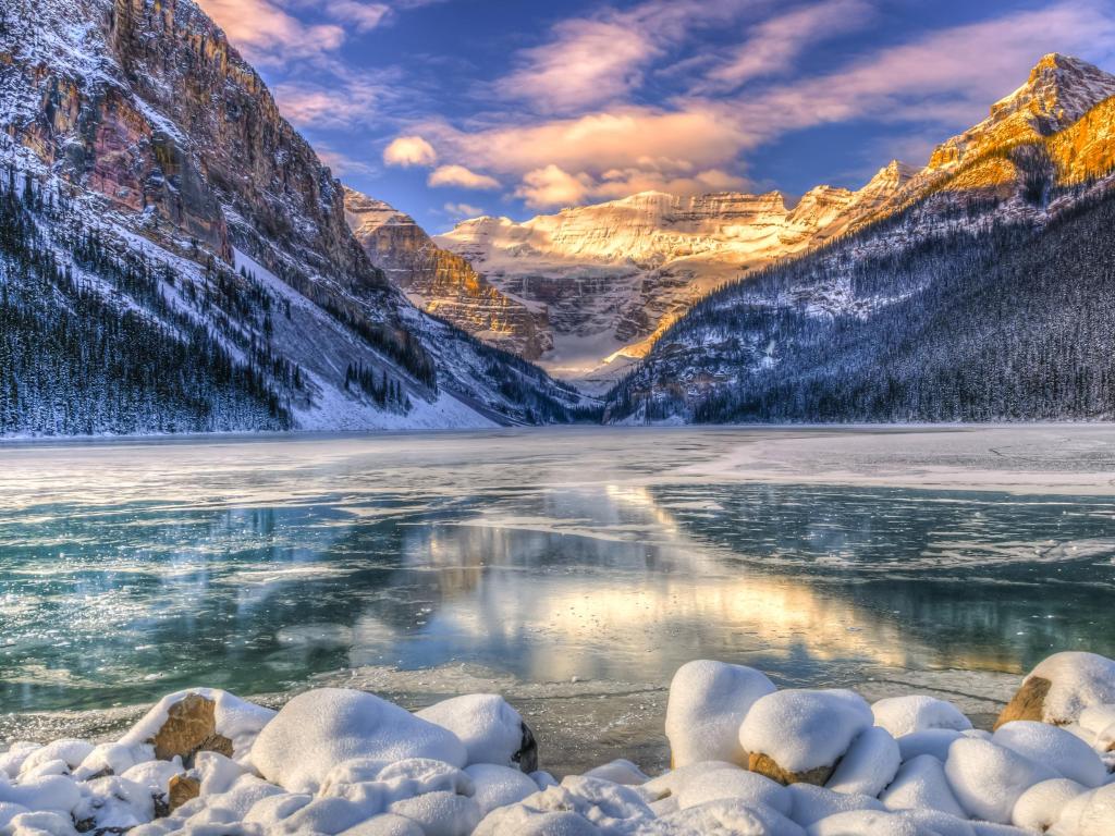 Winter sunrise over scenic Lake Louise and the Rocky Mountains in Banff National Park, Alberta Canada