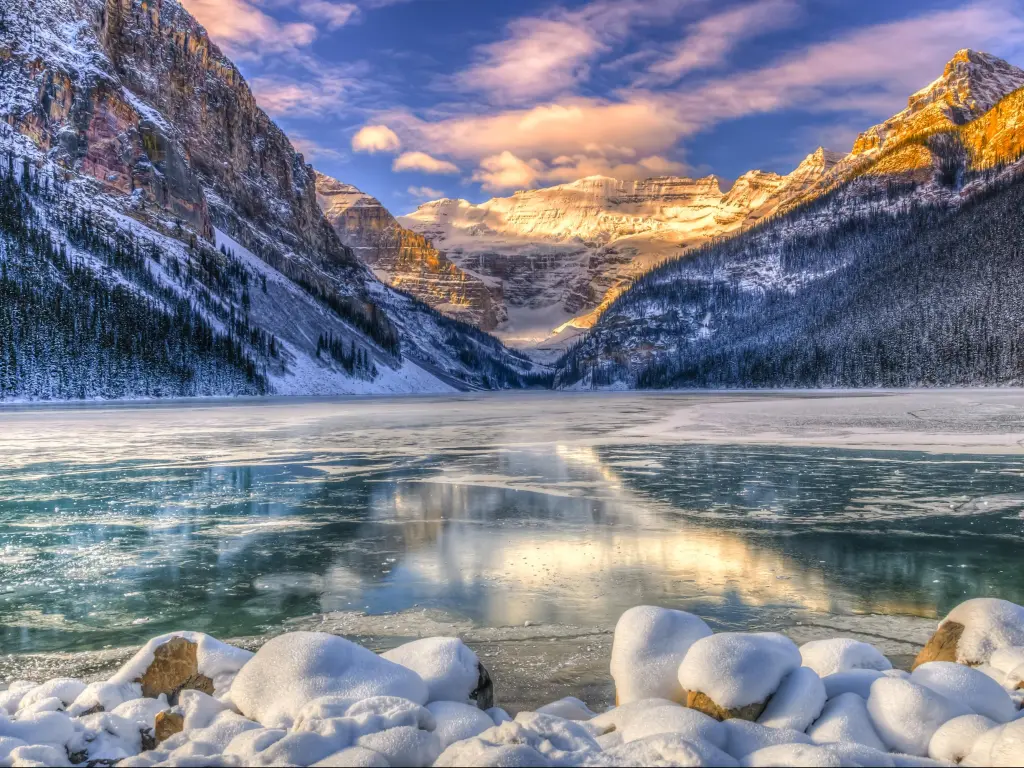 Winter sunrise over scenic Lake Louise and the Rocky Mountains in Banff National Park, Alberta Canada