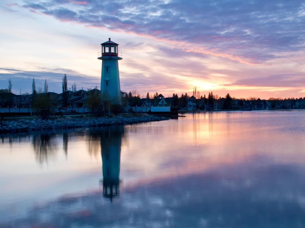 A lighthouse at the shore of Sylvan Lake Community on Alberta, Canada as a symbol of community building. A religious concept of light will reveal anything in darkness.