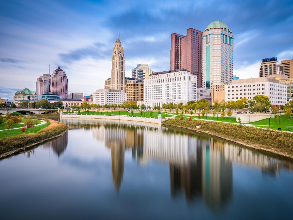 Columbus, Ohio, USA with the city skyline on the Scioto River taken on a clear sunny day.