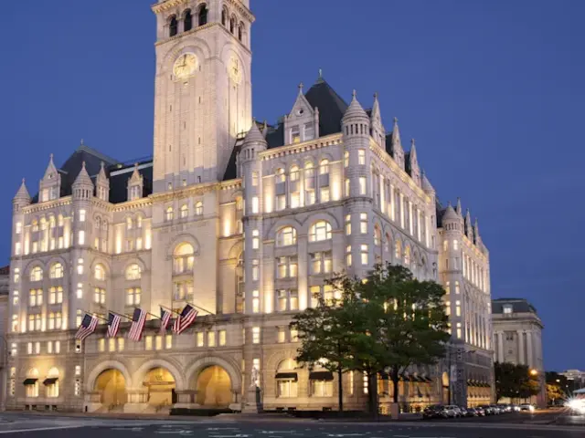 Outside view of the impressive brightly lit Waldorf Astoria Washington DC during the evening