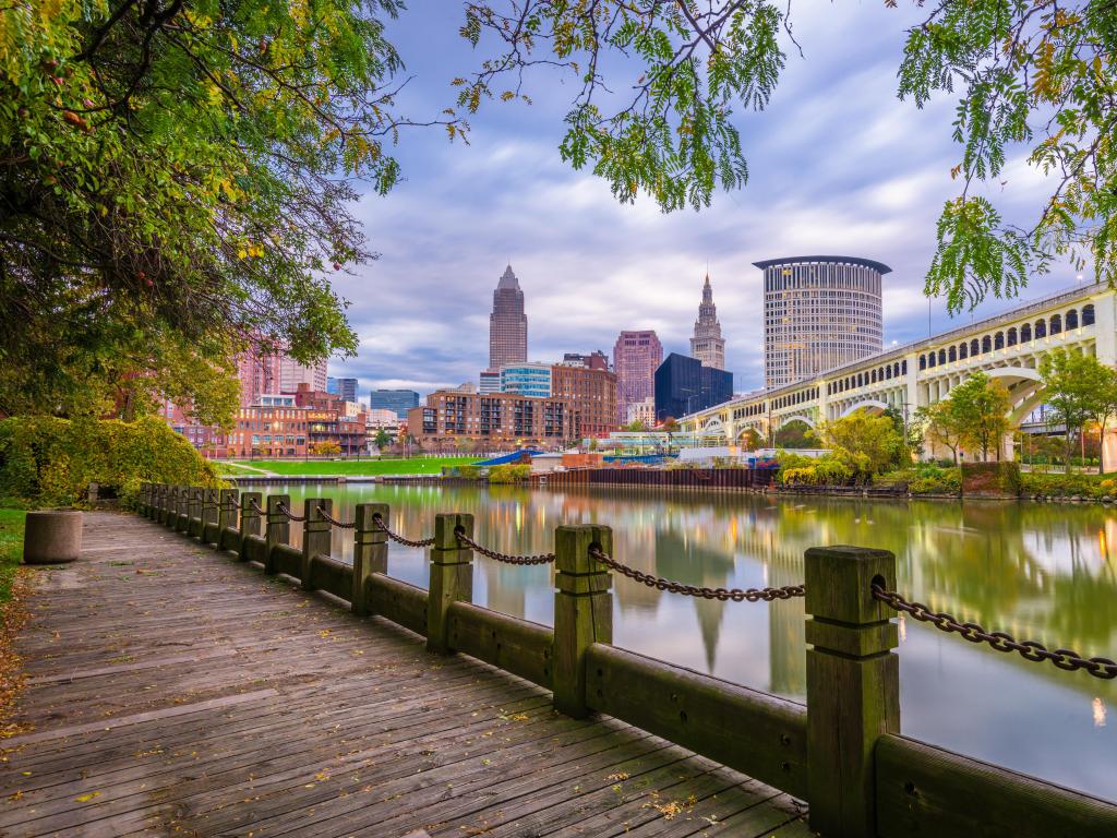 Cleveland, Ohio, USA downtown skyline on the Cuyahoga River at dusk.