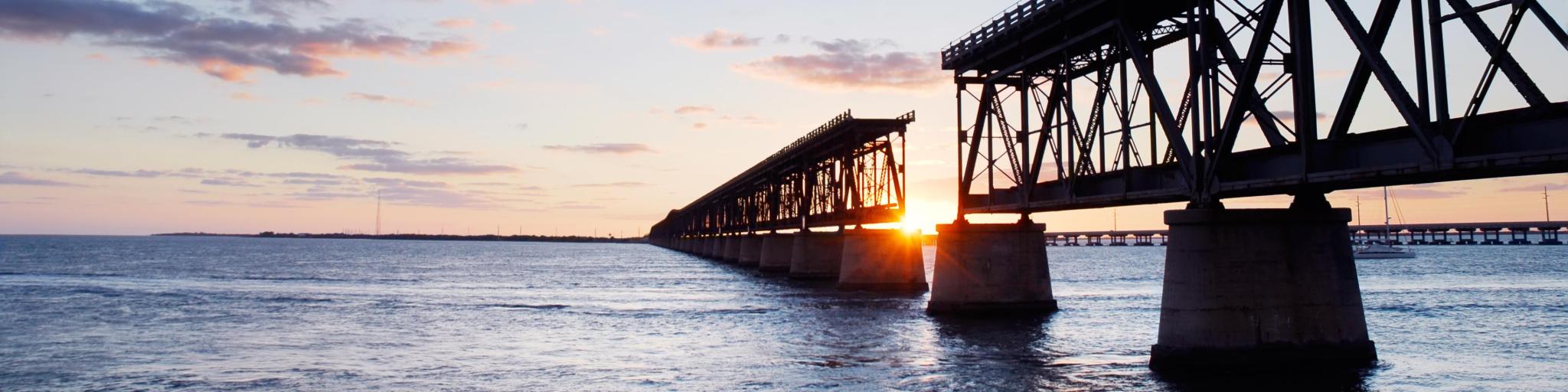Sunset behind the historic railroad bridge at Bahia Honda State Park in the Florida Keys