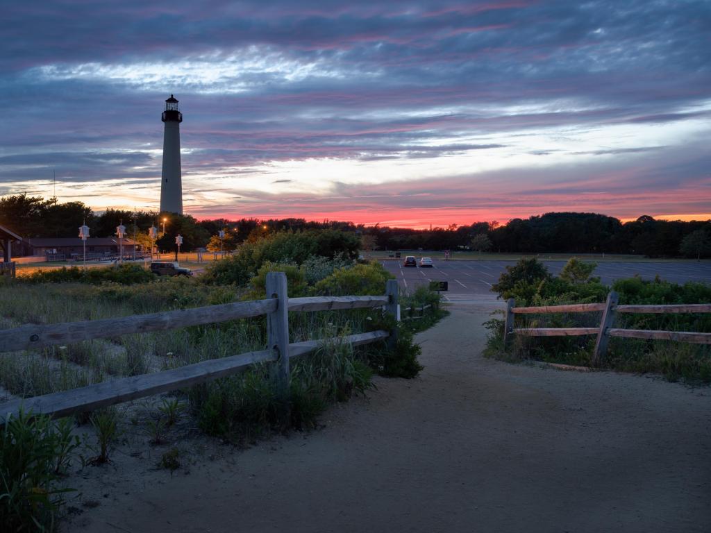 Cape May Lighthouse at sunset, viewed from across the beach at Cape May Point, New Jersey
