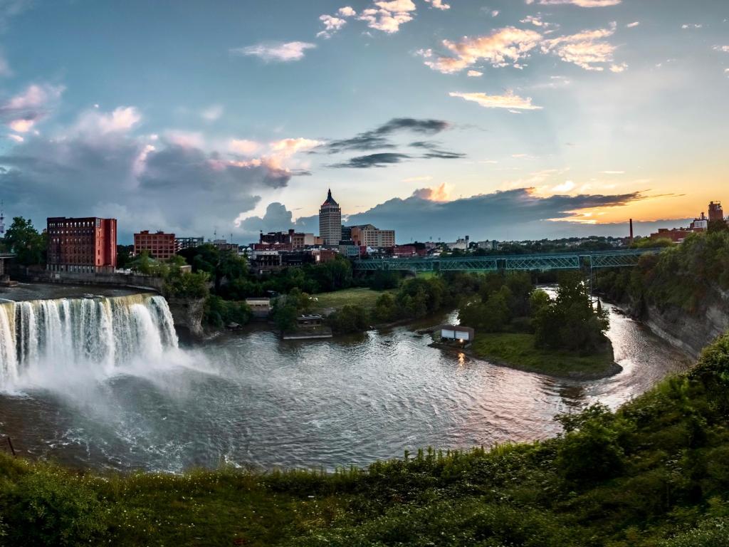 Rochester, New York, USA with a moody sunset over the city.