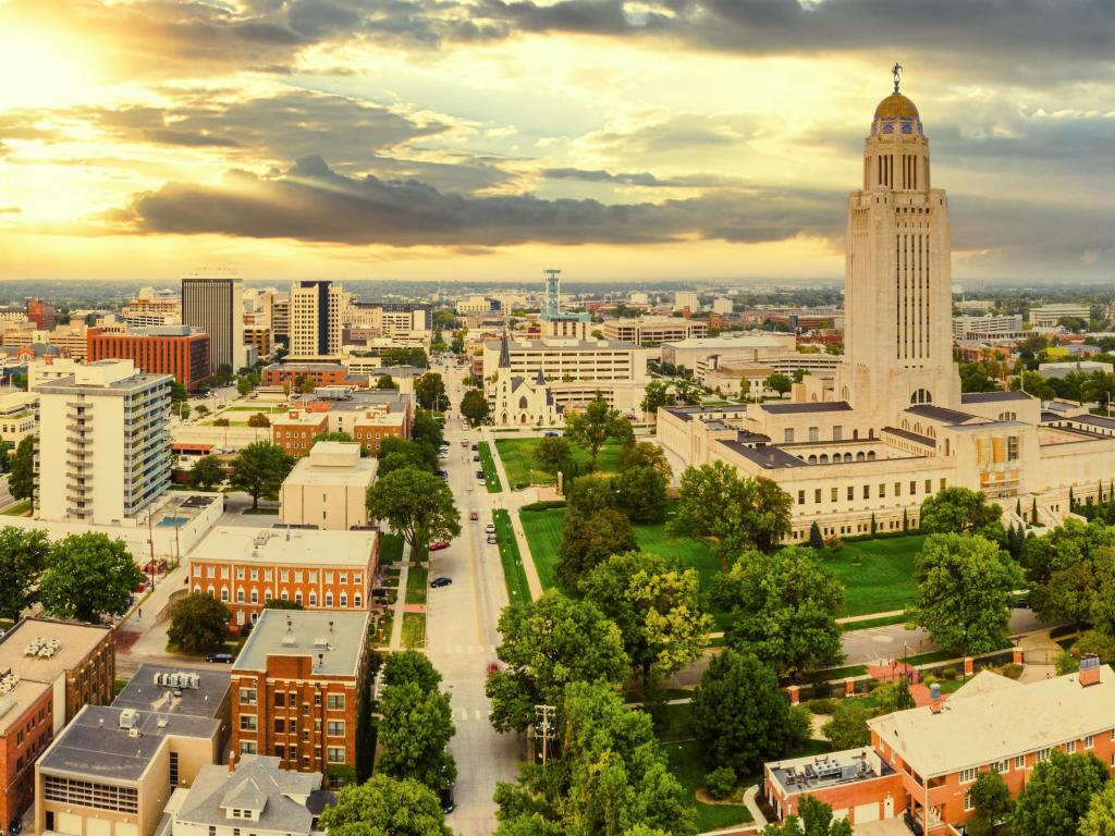 Lincoln, Nebraska, USA aerial panorama of Lincoln, Nebraska under a dramatic sunset. Lincoln is the capital city of the U.S. state of Nebraska and the county seat of Lancaster County