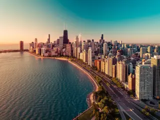 Chicago's skyline during sunrise, on the shore of Lake Michigan