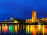 Sacramento, California, USA  with a panorama of Golden Gates drawbridge in Sacramento at night.